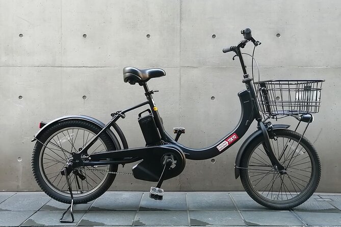 3h Tokyo E-Bike Tour: Hidden Gems, and Local Life with guide - Getting on the bike near Kanda Station