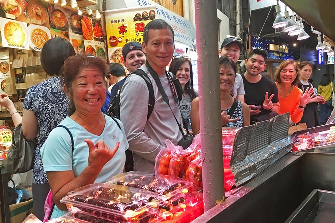 Eat, Drink & Cycle: Osaka Foodie Bike Tour - Meeting near Tsutenkaku, then getting fitted and rolling