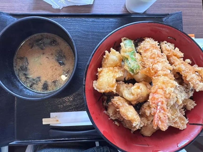 From Tokyo: Kamakura, Great Buddha, and Enoshima Bus Tour - Asakusa: Senso-ji, Kaminari-mon, and a Traditional Scene With Modern Tokyo in the Distance