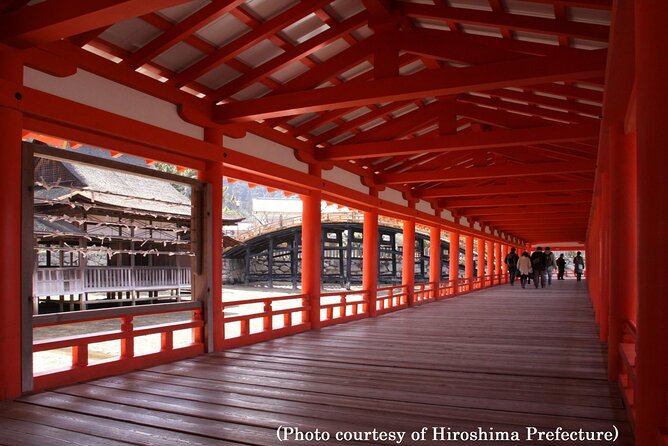 Full Day Hiroshima and Miyajima Bus Tour from Hiroshima - Itsukushima Shrine in real life: torii views, shrine architecture, and timing
