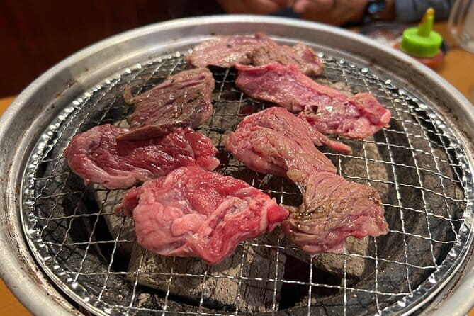 Ginza: Authentic Cuisine Tour in Tokyo - Stop 1 in Ginza: luxury streets, traditional dining, and a cultural walk