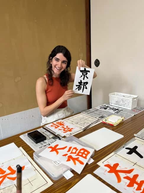 Kyoto: Calligraphy class at Buddhist temple in city center - What you take home: artwork, keychain, and photo help