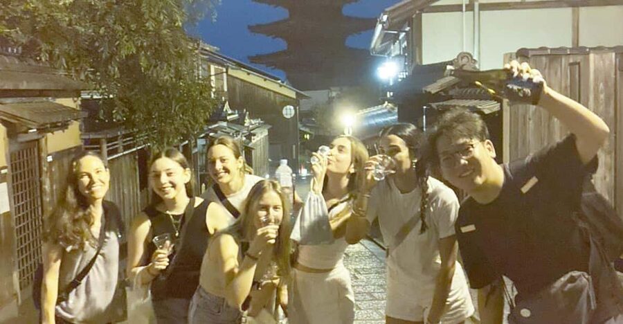 Kyoto: Gion Evening Walk with Hidden Gems, Geisha & Sake - Ninenzaka slopes and traditional street mood