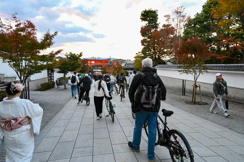 Kyoto: Half-day Guided Bike Tour with Fushimi Inari - Bikes, helmets, and the half-day pace (including e-bike options)