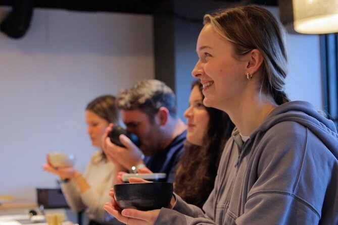 Matcha Making Class in Tokyo with Authentic Japanese Sweets Set - Photos, café setting, and the Asakusa atmosphere you feel
