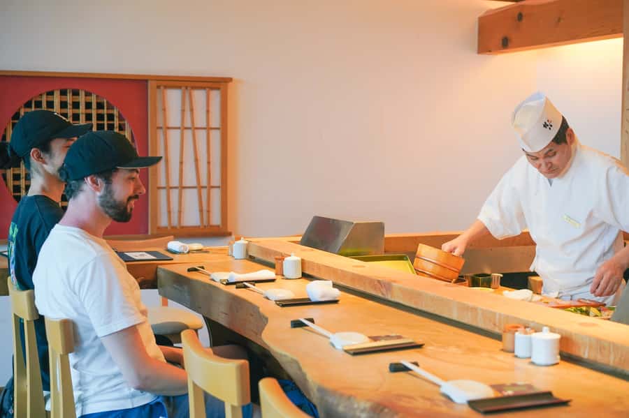Modern Vegan Night Foodie Tour in Tokyo - First restaurant hour: vegan okonomiyaki and guided food talk