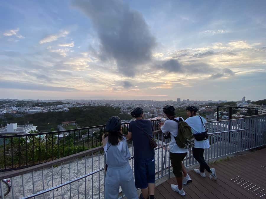 Okinawa: Afternoon Cycling Tour with Local Guide - Shuri Castle town streets: cobblestones, temples, and everyday religion