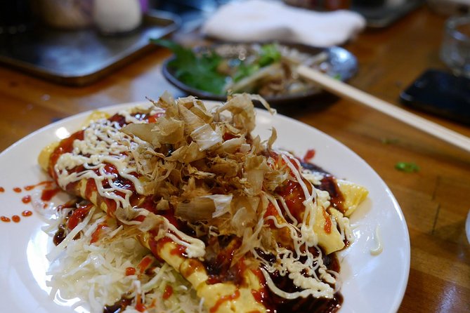 Osaka After Dark: Small-Group Night Food Tour (Max 6) - Tenjimbashisuji covered shopping street: not a shopping spree