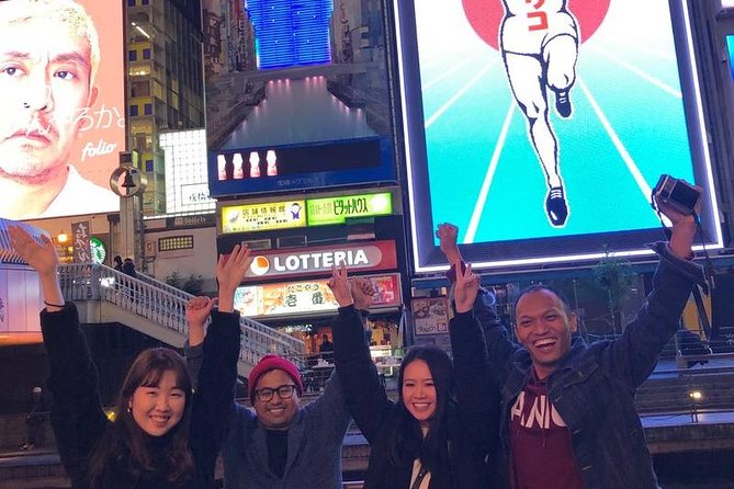 Osaka Bar Hopping Night Walking Tour in Namba (3 bars, 6 tastes) - Photo break at the Glico billboard and a pass through Shinsaibashi-suji