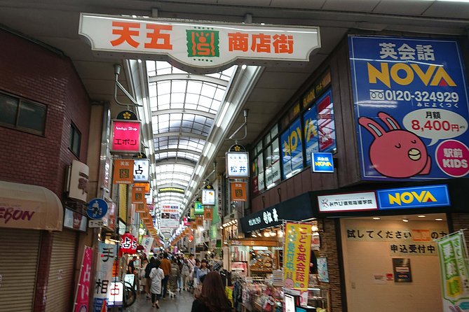 Osaka Castle & Dotonbori Lively One-Day Walking Tour - Stop 5: Kuromon Market for Osaka food culture, fast and fun