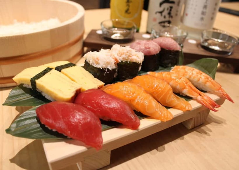 Osaka Dotonbori: Sushi Making Experience - The cosplay and sake angle that makes it feel like Osaka