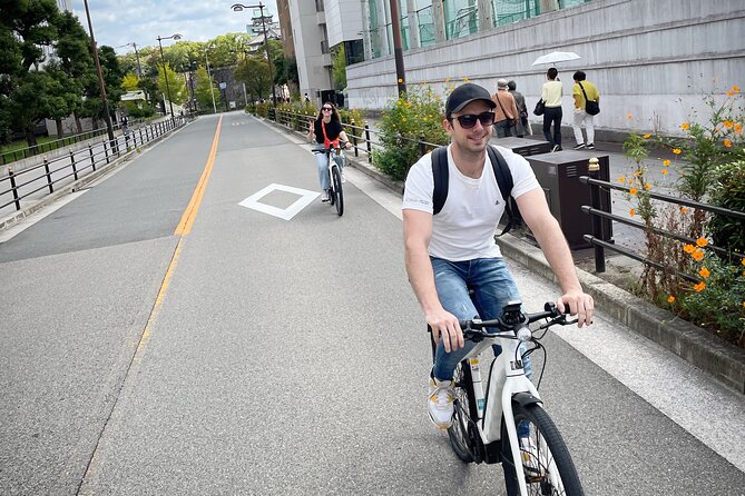 Osaka E-Bike Tour with a Local Guide - Nakanoshima Park: a rose garden break and a mini picnic rhythm