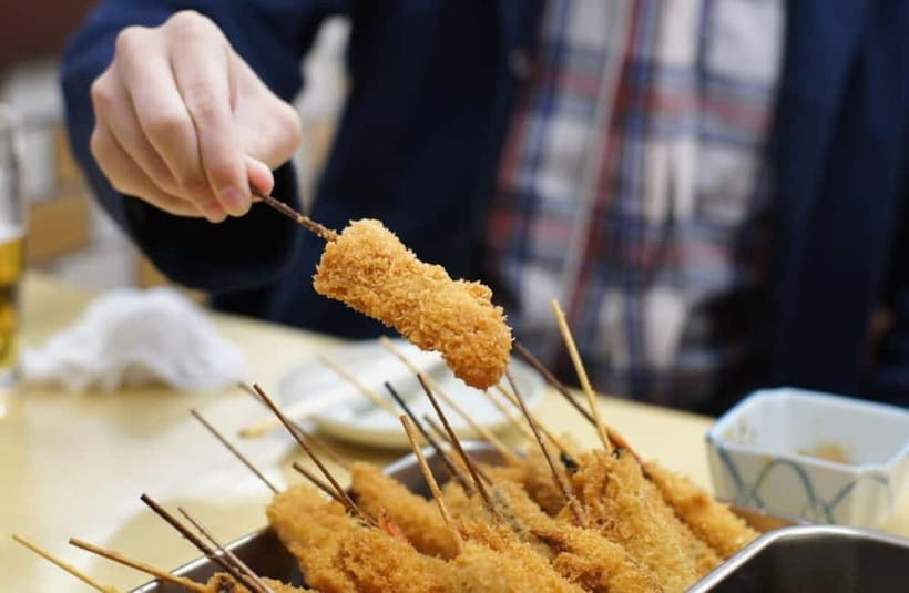 Osaka: Food Tour Kuromon Market & Dotonbori with Guide - Hozenji area walking plus Kushikatsu Yokozuna okonomiyaki and skewers