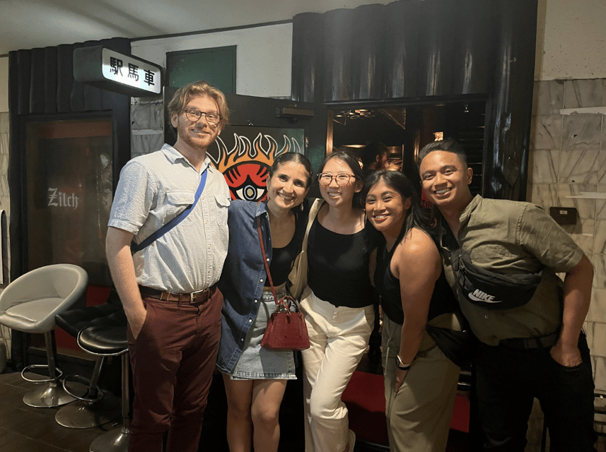 Osaka: Izakaya Bars Guided Walking Tour - Meeting at Dotombori Humanity Song Monument, then getting oriented fast
