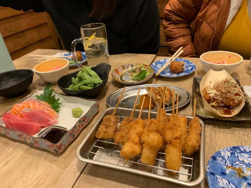 Osaka: Namba Pub Bar Crawl with a Local Guide - American Village finish: cocktails, spirits, and a whisky-tasting moment
