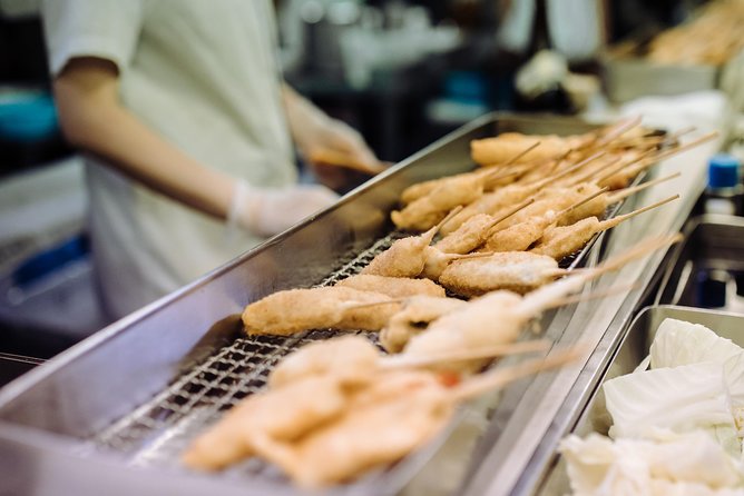 Osaka Private Food Tours by Local Foodies: 100% Personalized - A quieter side lane: moss temple calm, then izakaya skewers and sake