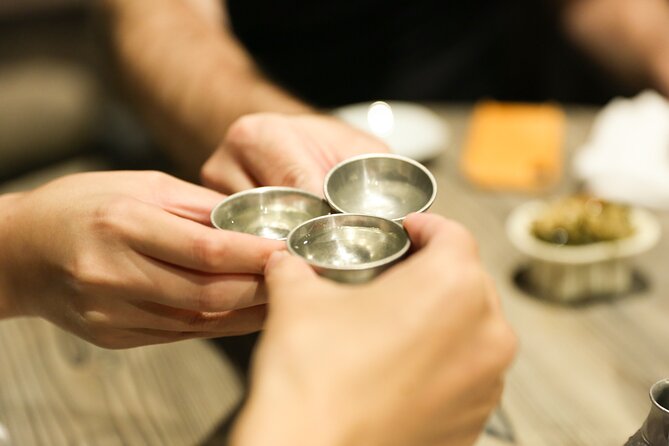 Private Food & Sake Tour in Central Kyoto with Sake Sommelier - Stop 1 at a Kyoto machiya izakaya: townhouse atmosphere and smart first orders
