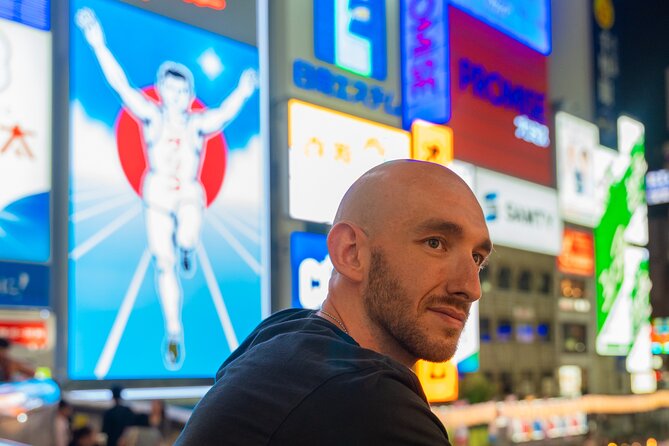 Private Vibrant Night Photoshoot Experience in Osaka (Dotonbori) - The First Big Shot: Getting Glico Sign Photos That Actually Look Right