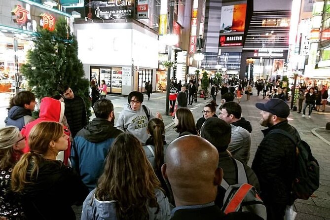 The Dark Side of Tokyo - Night Walking Tour Shinjuku Kabukicho - A Shinto shrine moment inside Shinjuku noise