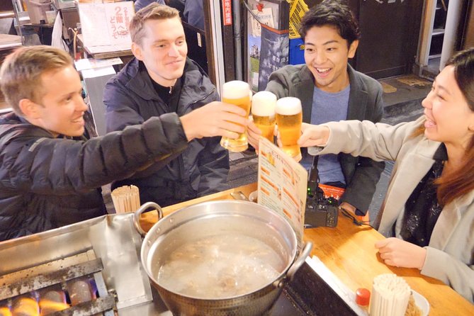 Tokyo Bar Hopping Tour in Shinjuku (All-You-Can-Drink + Dinner) - Where the Night Starts, by the Uniqlo Black Pillar