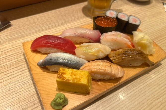 Tokyo: Best Ginza Food Tour at 3 Local Eateries - Shimbashi at night: grilled bites and office-worker energy