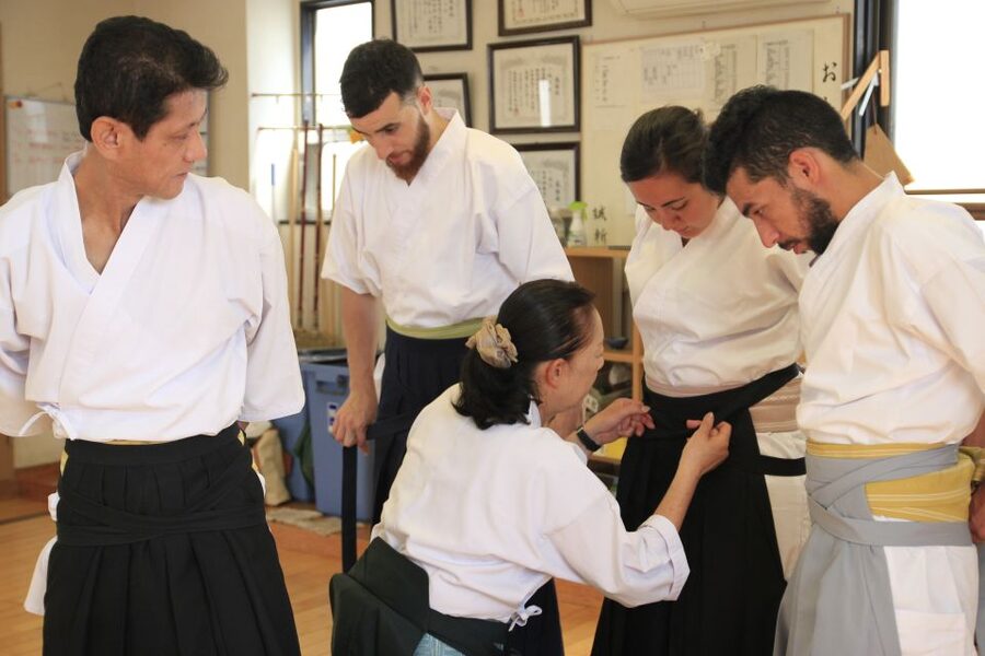 Tokyo: Samurai Sword & Archery Class from Samurai Descendant - Holding historic gear: antique matchlock gun hands-on moment