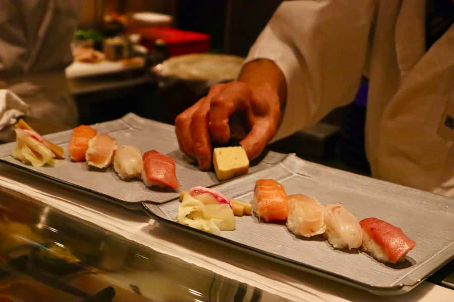 Tokyo: Secret Food Walking Tour - First stop: fresh sushi and how it sets the tone