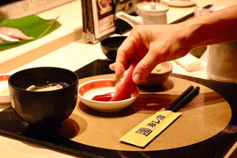 Tokyo: Secret Food Walking Tour - Gyoza next in downtown streets: fried or steamed, and why it’s fun