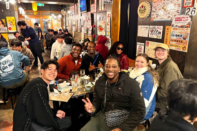 Tokyo: Shibuya Authentic Food Tour & Local Delights - Meeting at Shibuya Tsutaya, then following your guide into the maze