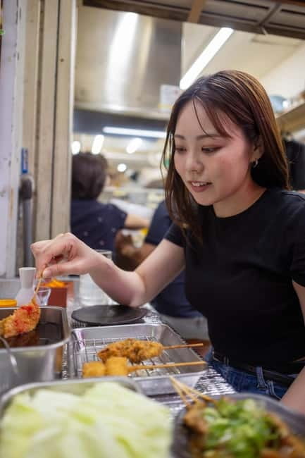 Tokyo: Shibuya Food Tour, Neon Lights & Local Flavors - Shibuya Crossing Neon and a Konbini Snack Break