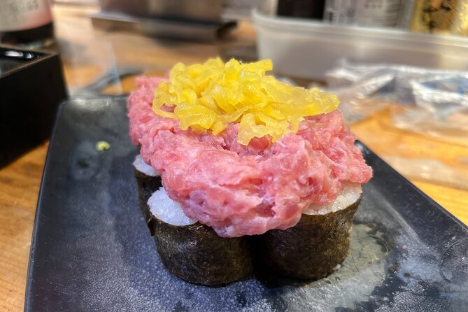 Tokyo: Shinjuku Food Tour (13 Dishes at 4 Local Eateries) - Omoide Yokocho: narrow alleys, tiny stalls, and big atmosphere