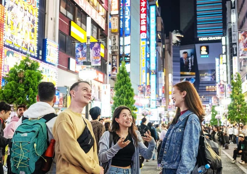 Tokyo: Shinjuku Nightlife & Secret Backstreets Walking Tour - Meeting at the Shinjuku East Exit Police Box, then stepping into the night