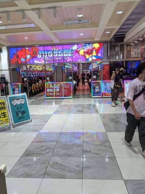 Tokyo Shinjuku : Private Walking Night Tour with Pachinko - Entering Shinjuku After Dark With a Private Guide