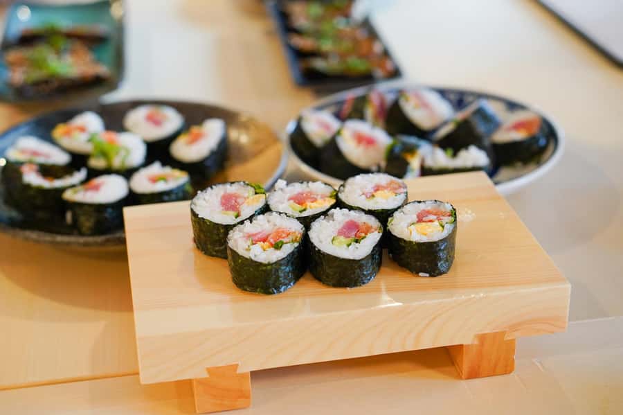 Tokyo: Sushi Cooking Class with Sake Tasting - Entering the Iriya supermarket hunt at the meeting point